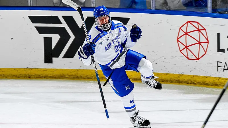 Ice hockey player skating with a stick beside the rink boards